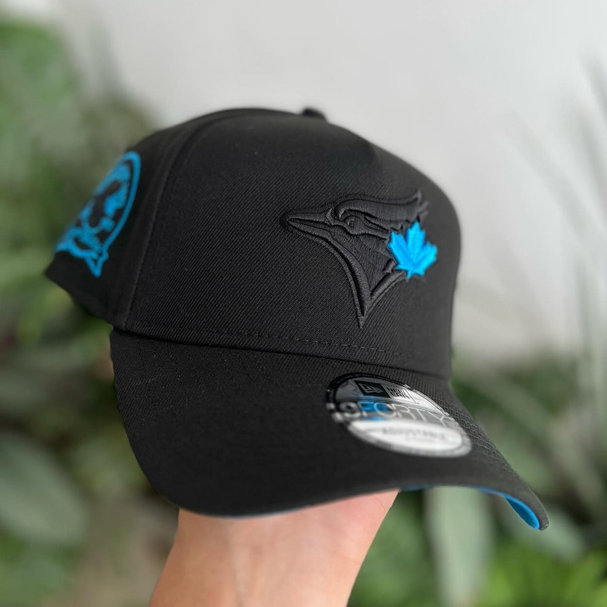 NEW ERA TORONTO BLUE JAYS BLACK BLUE 9FORTY A FRAM EMBROIDERED CASUAL BASEBALL CAP